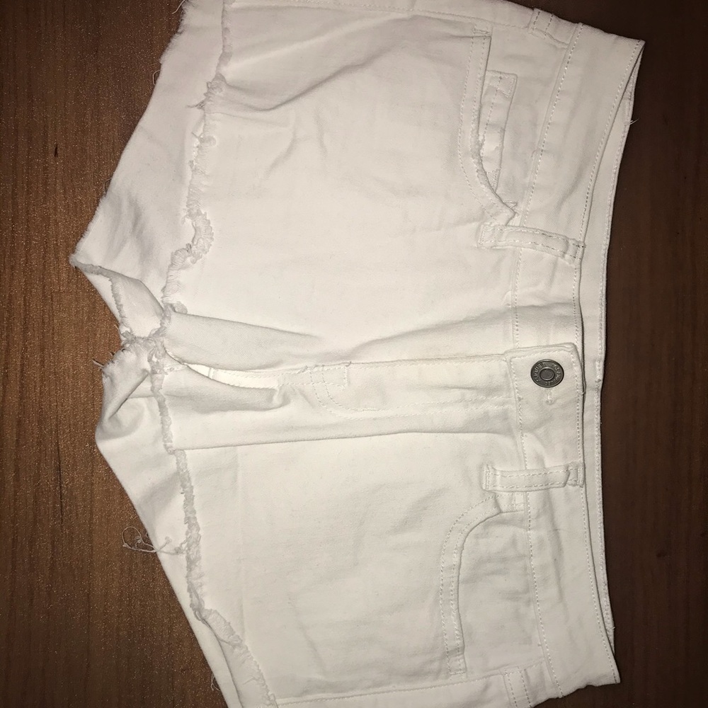 White low rise jean shorts.